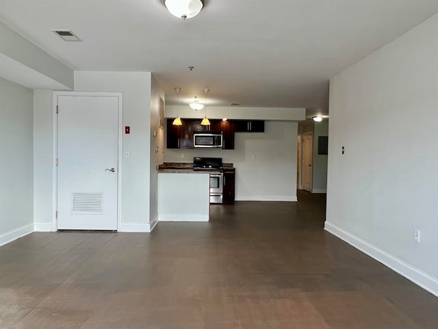 kitchen featuring dark brown cabinets and stainless steel appliances