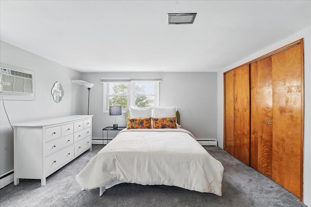 221 Terrace Ave, Jersey City, NJ 07307 - carpeted bedroom featuring an AC wall unit and a baseboard radiator