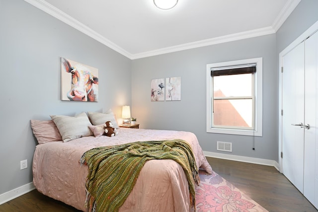 118 Irving St Unit 1, Jersey City, NJ 07307 - bedroom featuring crown molding, dark wood finished floors, and baseboards
