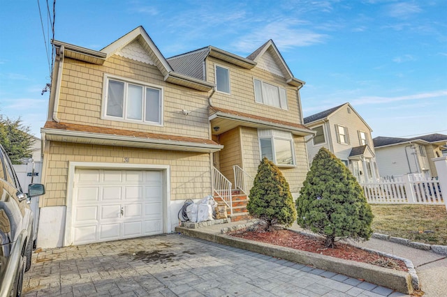 view of front of home featuring a garage