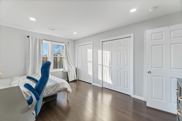 225 Freeman Ave, Jersey City, NJ 07306 - bedroom featuring recessed lighting, two closets, dark wood-type flooring, and baseboards