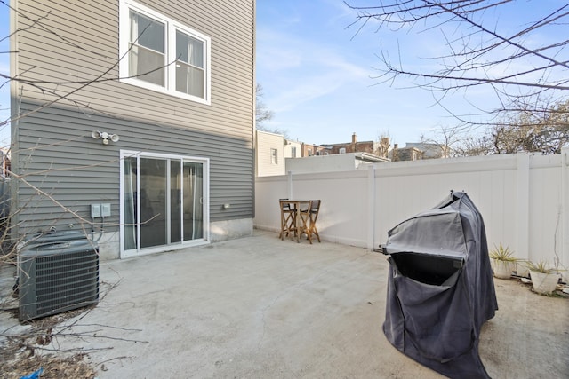 225 Freeman Ave, Jersey City, NJ 07306 - view of patio featuring central AC and fence