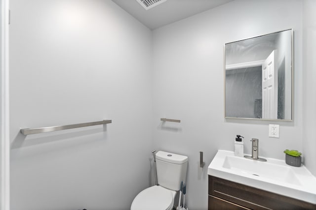 225 Freeman Ave, Jersey City, NJ 07306 - half bath with vanity, toilet, and visible vents