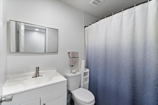 225 Freeman Ave, Jersey City, NJ 07306 - full bath featuring visible vents, toilet, and vanity