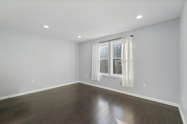 225 Freeman Ave, Jersey City, NJ 07306 - spare room featuring recessed lighting, baseboards, and dark wood-style floors