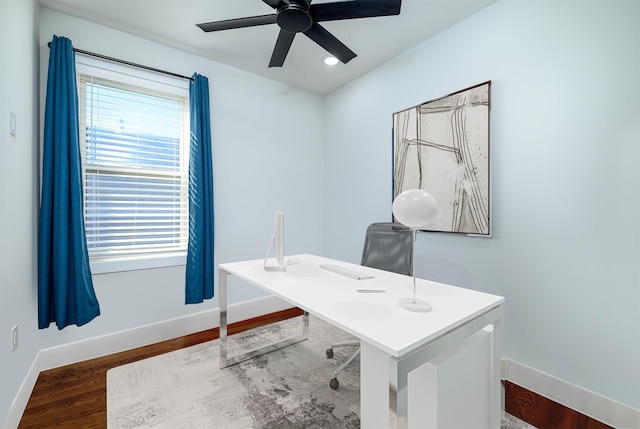 office featuring ceiling fan and dark wood-type flooring