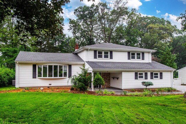 44 Grover Dr, Wayne, NJ 07470 - split level home featuring a front yard, a chimney, and roof with shingles