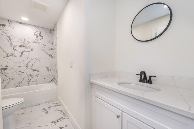 44 Grover Dr, Wayne, NJ 07470 - bathroom with marble look tiles, vanity, recessed lighting, and shower / tub combination