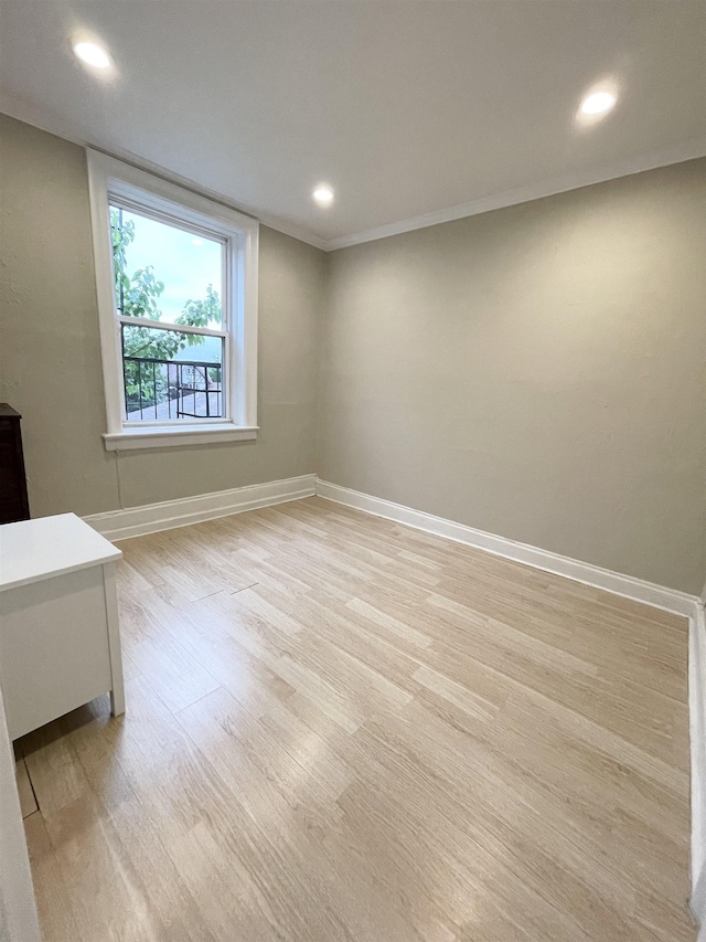 18 74th St Unit D5, North Bergen, NJ 07047 - empty room with baseboards, light wood-style floors, recessed lighting, and crown molding
