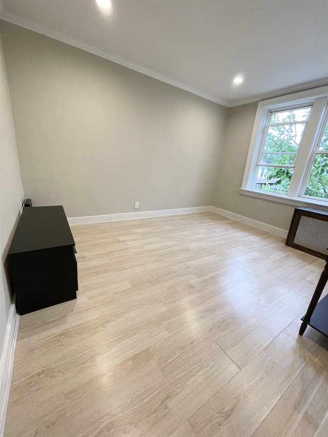 18 74th St Unit D5, North Bergen, NJ 07047 - unfurnished room with light wood-style flooring, baseboards, recessed lighting, and ornamental molding