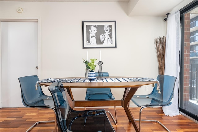 sitting room featuring hardwood / wood-style floors and plenty of natural light