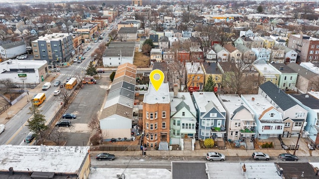 birds eye view of property with a residential view