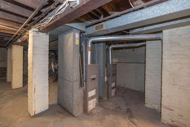 basement featuring heating unit