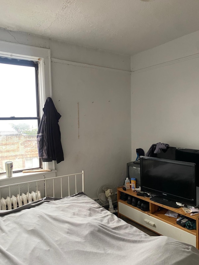 6414 Park Ave Unit 8, West New York, NJ 07093 - bedroom with a textured ceiling