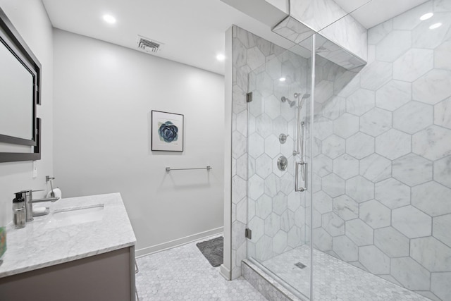 full bath featuring vanity, a shower stall, recessed lighting, and visible vents