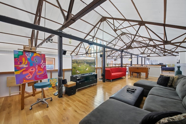 living room featuring pool table and hardwood / wood-style floors