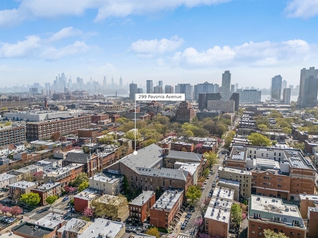 birds eye view of property with a city view