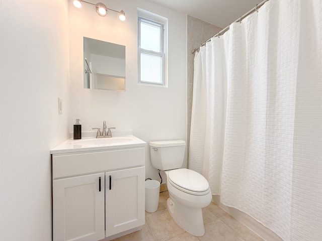 full bath with a shower with curtain, toilet, vanity, and tile patterned floors