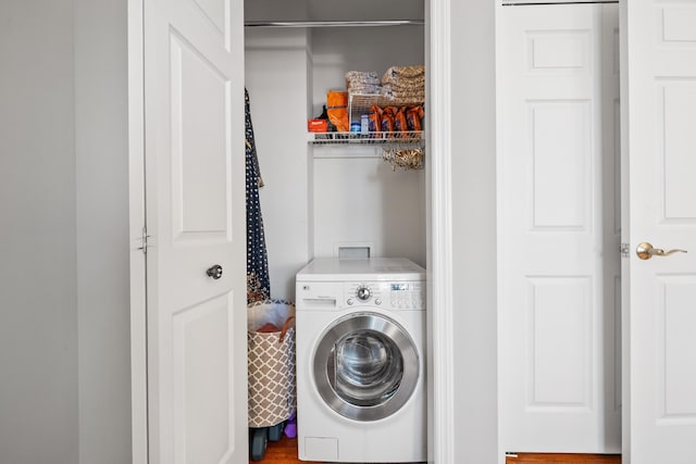 laundry room with washer / dryer