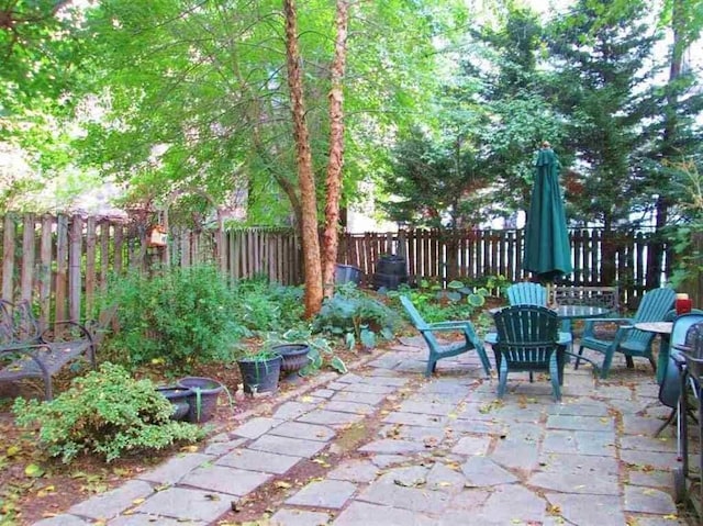 237 3rd St Unit 1, Jersey City, NJ 07302 - fenced backyard with a patio area