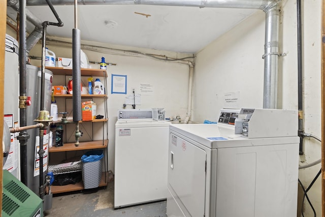 237 3rd St Unit 1, Jersey City, NJ 07302 - laundry area featuring separate washer and dryer and secured water heater