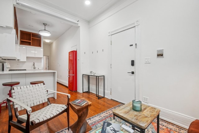 237 3rd St Unit 1, Jersey City, NJ 07302 - living room featuring wood finished floors and baseboards