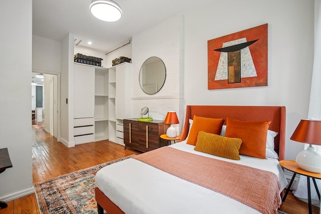 237 3rd St Unit 1, Jersey City, NJ 07302 - bedroom with wood finished floors and baseboards