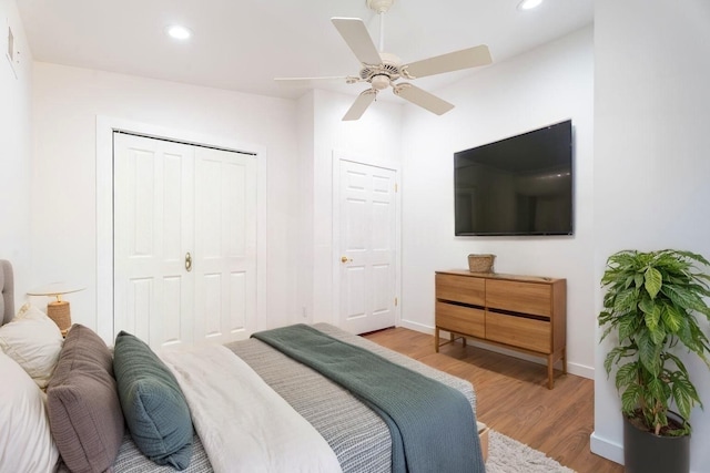 238 Undercliff Ave, Edgewater, NJ 07020 - bedroom with wood finished floors, recessed lighting, a closet, and ceiling fan