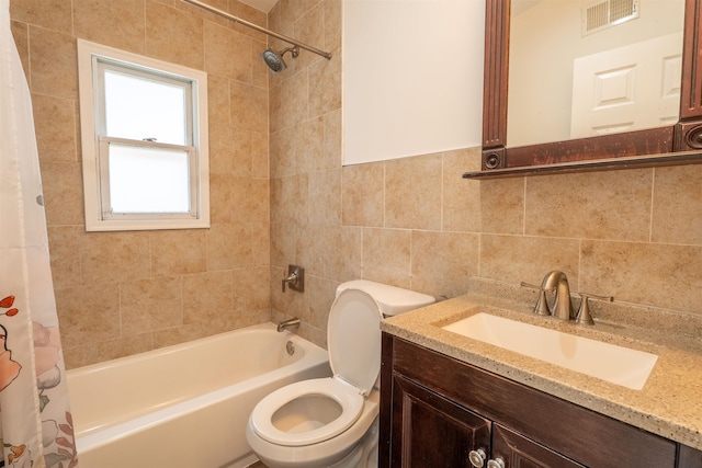 238 Undercliff Ave, Edgewater, NJ 07020 - bathroom featuring shower / bathtub combination with curtain, vanity, and tile walls