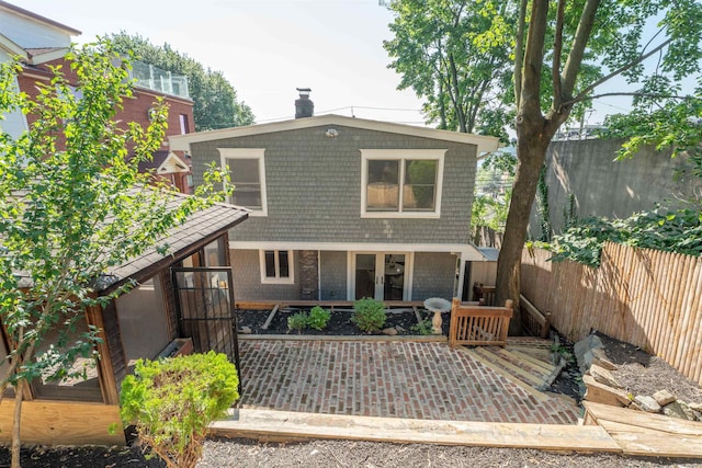 238 Undercliff Ave, Edgewater, NJ 07020 - back of house featuring a fenced backyard, a chimney, and a wooden deck
