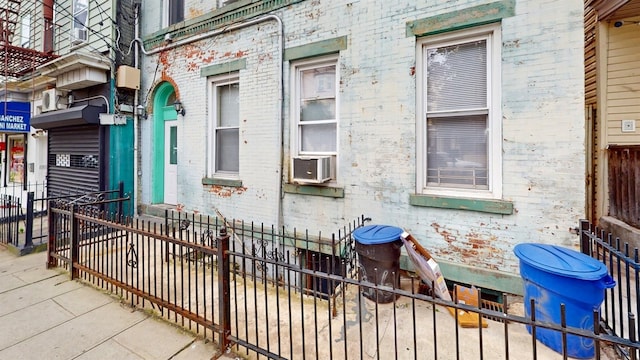 view of home's exterior with cooling unit