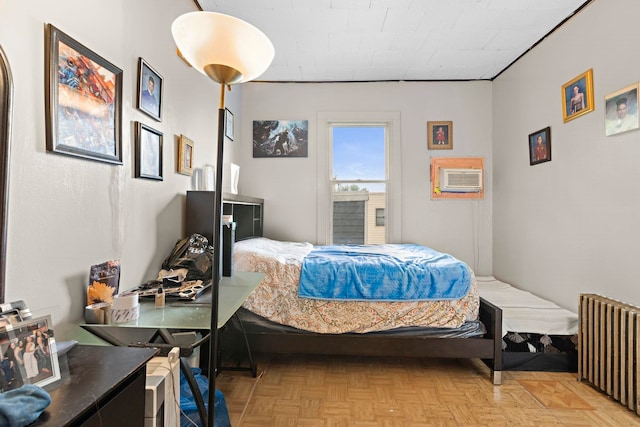 58 Booraem Ave, Jersey City, NJ 07307 - bedroom with radiator and a wall mounted air conditioner