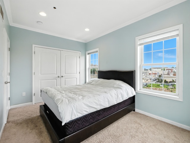 5808 Washington St Unit 406A, West New York, NJ 07093 - bedroom featuring carpet, a closet, ornamental molding, multiple windows, and recessed lighting