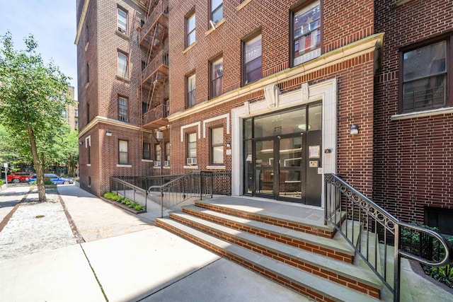 275 Harrison Ave Unit D8, Jersey City, NJ 07304 - doorway to property featuring brick siding