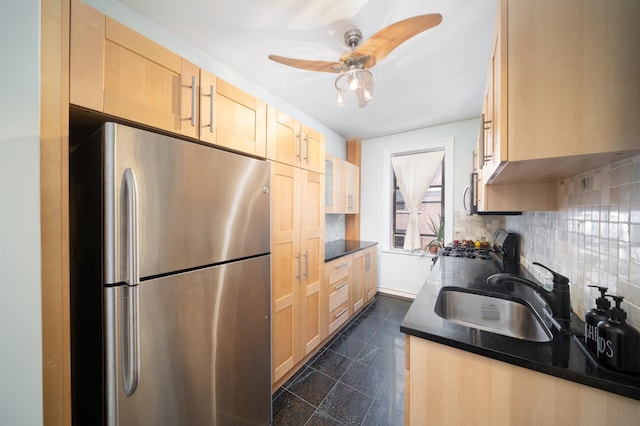 275 Harrison Ave Unit D8, Jersey City, NJ 07304 - kitchen featuring freestanding refrigerator, light brown cabinetry, stove, decorative backsplash, and a ceiling fan