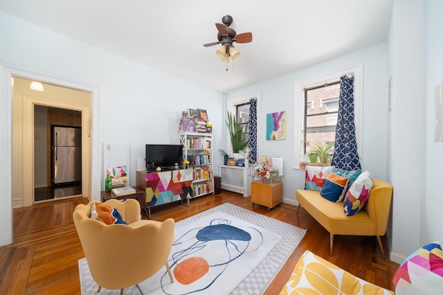 275 Harrison Ave Unit D8, Jersey City, NJ 07304 - playroom with a ceiling fan, wood finished floors, and radiator heating unit