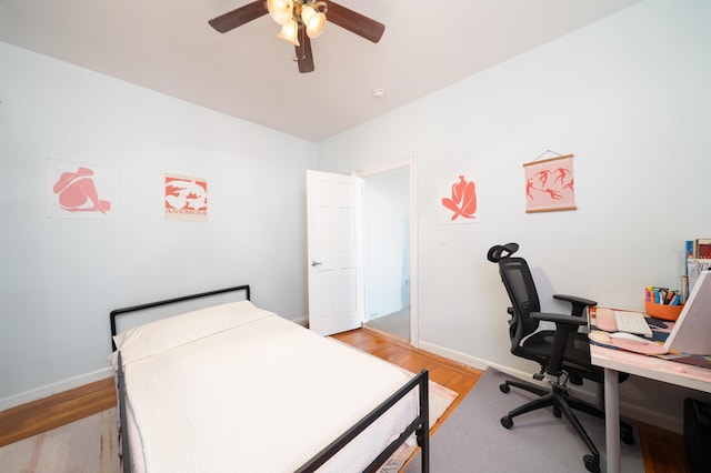 275 Harrison Ave Unit D8, Jersey City, NJ 07304 - bedroom with a desk, light wood-style floors, and a ceiling fan