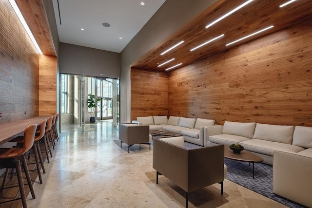 99 Hudson St Unit 4102, Jersey City, NJ 07302 - community lobby featuring wooden walls, a towering ceiling, and recessed lighting