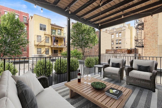 balcony with an outdoor hangout area