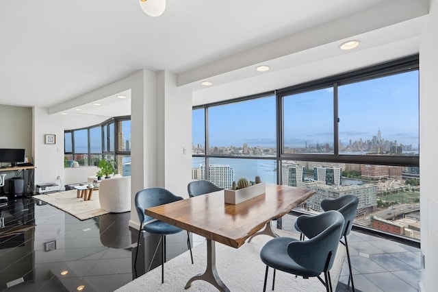 380 Mountain Rd Unit 1012, Union City, NJ 07087 - dining room with a view of skyline, recessed lighting, and a water view