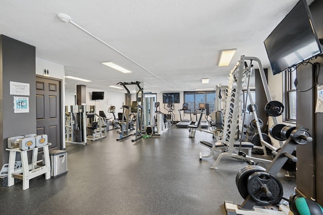 380 Mountain Rd Unit 1012, Union City, NJ 07087 - exercise room featuring a textured ceiling