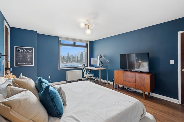 380 Mountain Rd Unit 1012, Union City, NJ 07087 - bedroom featuring baseboards and wood finished floors