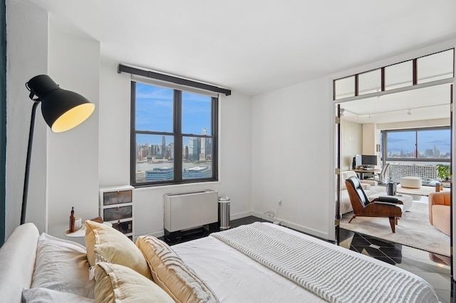 380 Mountain Rd Unit 1012, Union City, NJ 07087 - bedroom with granite floors and baseboards