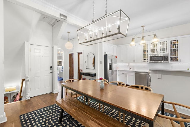 908 Garden St Unit 1, Hoboken, NJ 07030 - dining space featuring dark wood finished floors and a chandelier