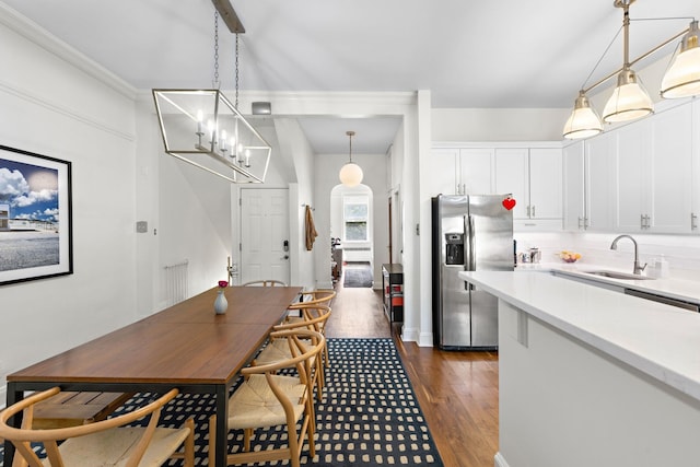 908 Garden St Unit 1, Hoboken, NJ 07030 - dining room featuring dark wood-type flooring and a chandelier