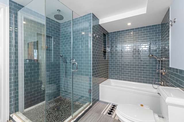 908 Garden St Unit 1, Hoboken, NJ 07030 - full bathroom featuring toilet, a stall shower, a tub, recessed lighting, and tile patterned floors