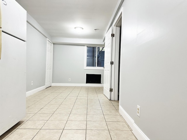 552 38th St Unit B4, Union City, NJ 07086 - unfurnished room with light tile patterned floors and a pendent fire sprinkler
