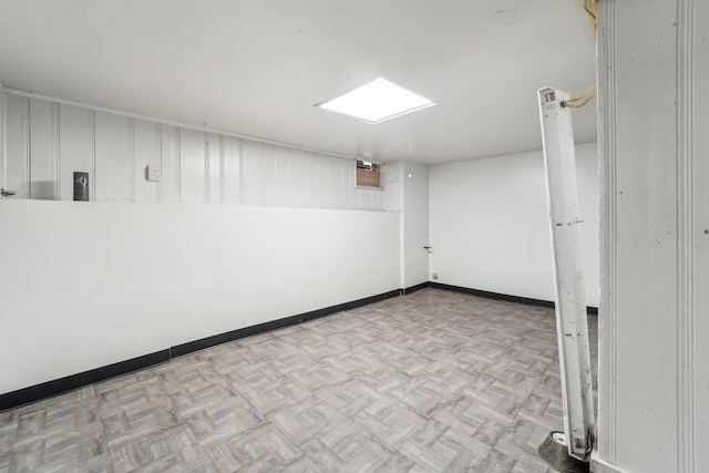 basement featuring light parquet flooring