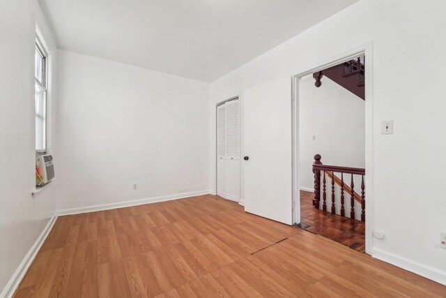 spare room with light hardwood / wood-style floors