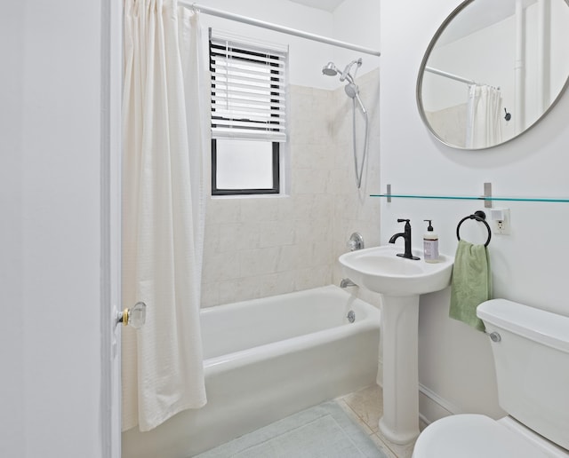 full bath featuring tile patterned flooring, shower / bath combination with curtain, and toilet